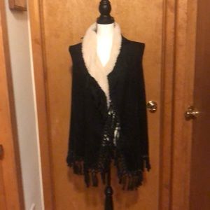 Black sleeveless fringe jacket